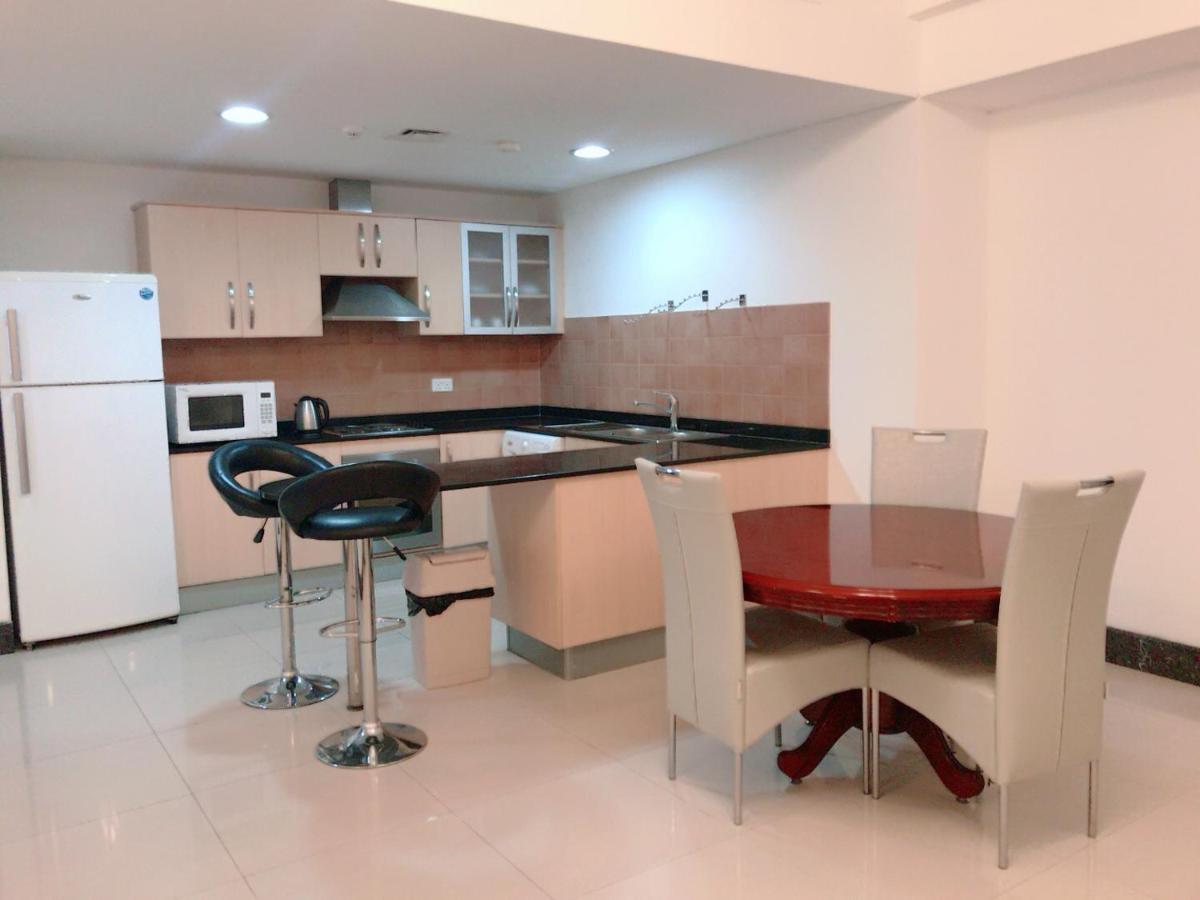 Stout Apartments Manama Phòng bức ảnh