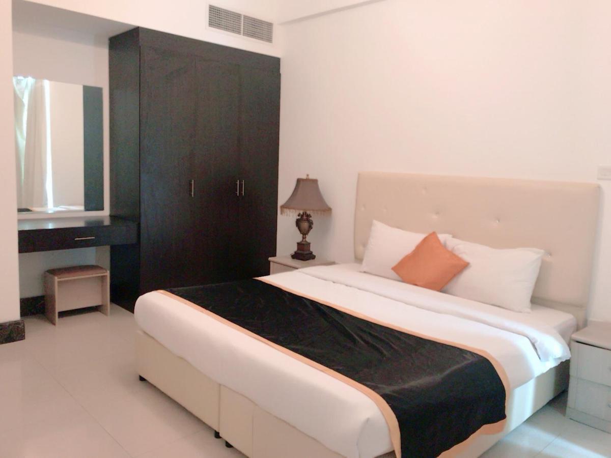 Stout Apartments Manama Phòng bức ảnh